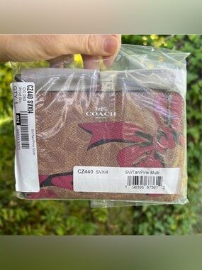 COACH Corner Zip Wristlet In Signature Canvas with Red Bow Print CZ440 NWT